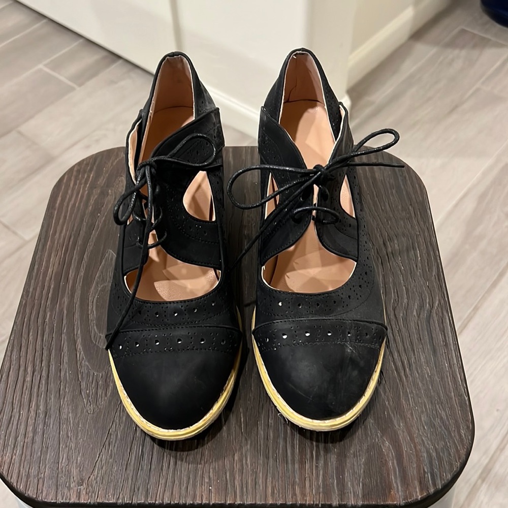Black suede shoes.